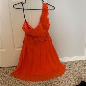 Orange pleated chiffon dress